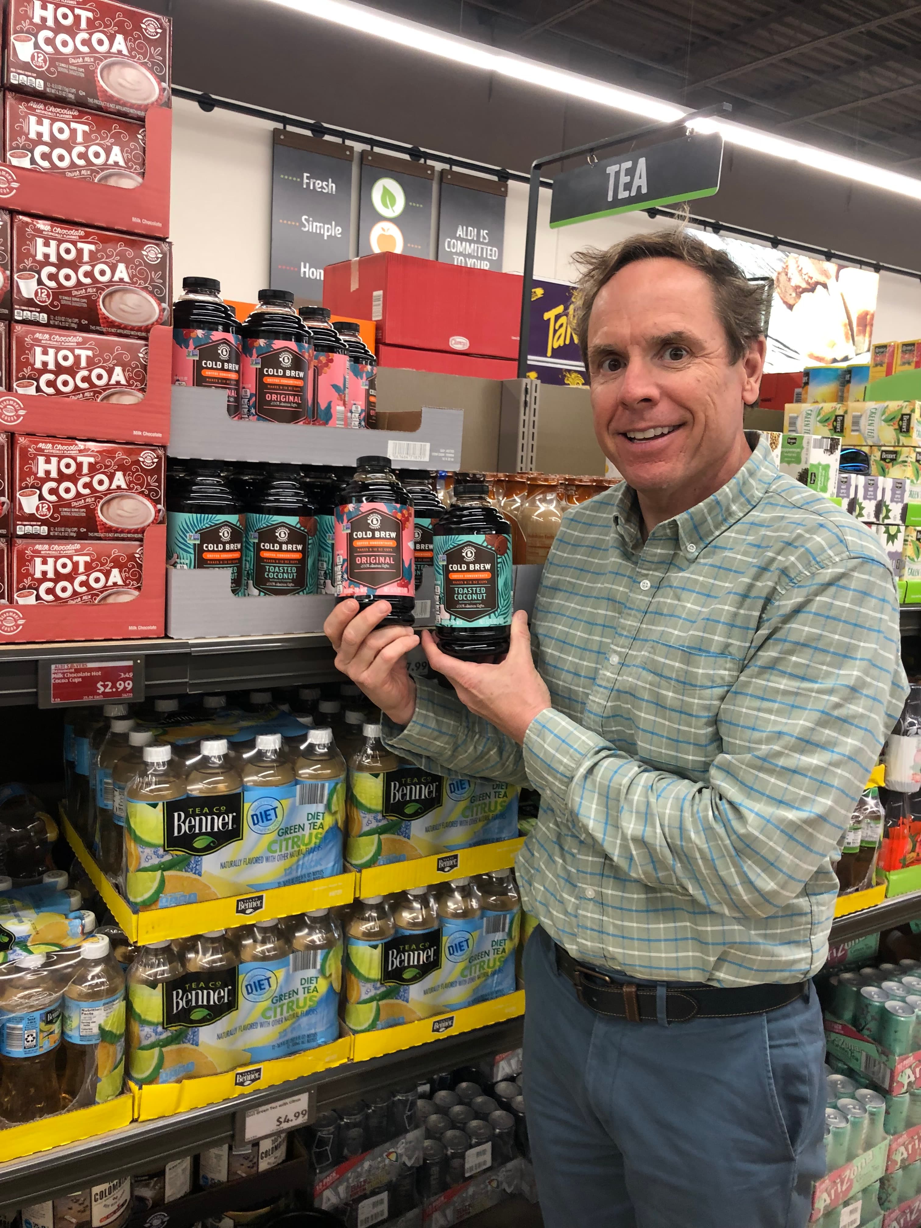Tom Sessions with a private label cold brew product placed at Aldi